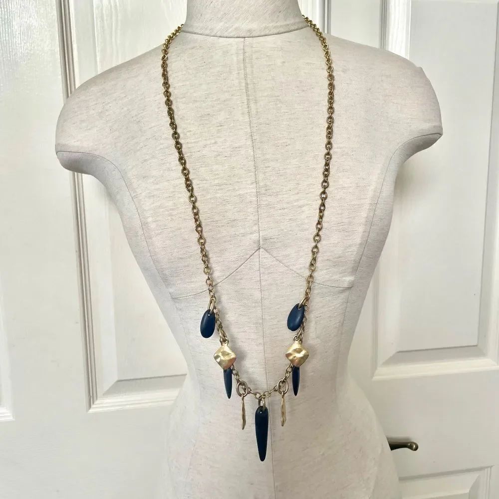 Gold tone and  navy charm statement necklace